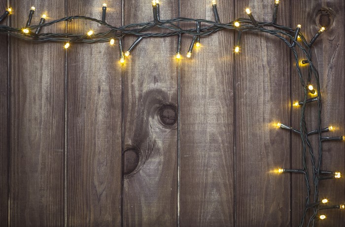 Fairy lights on wood planks