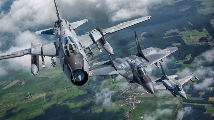 Sukhoi Su-22M4, Mikoyan MiG-29, and F-16 Fighting Falcon in flight