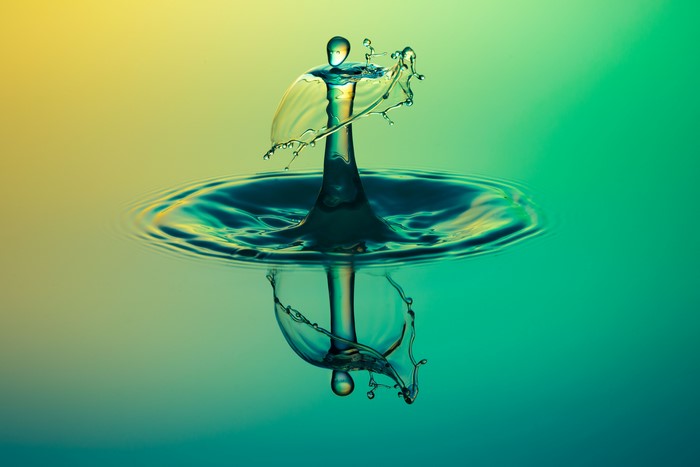 Water drops colliding in macro photography