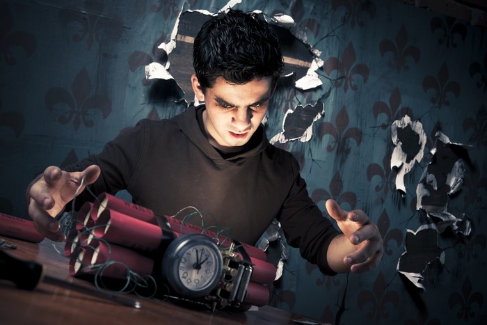 Man with dynamite bomb and clock