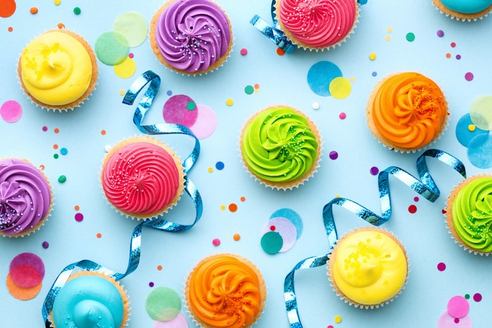 Multicolor Cupcakes with Ribbons and Confetti
