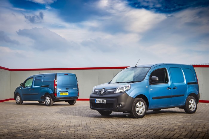 Two light blue Renault Kangoo vans