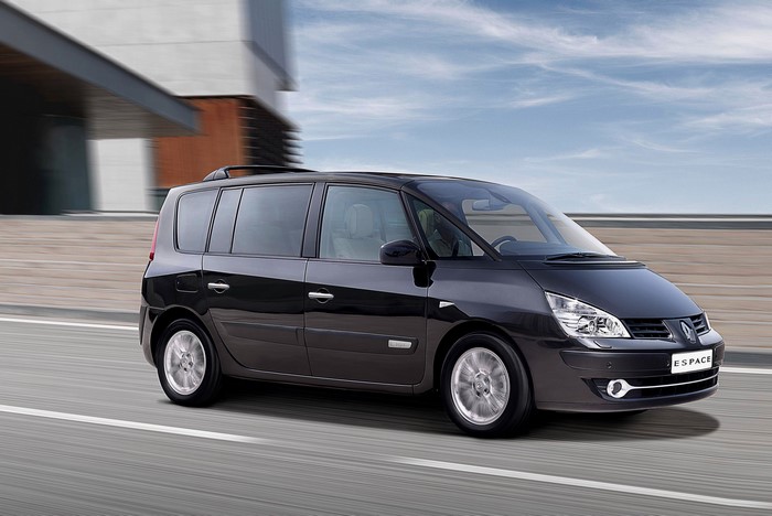 Black Renault Espace driving on a road