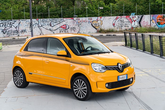 Yellow Renault Twingo with Graffiti Wall