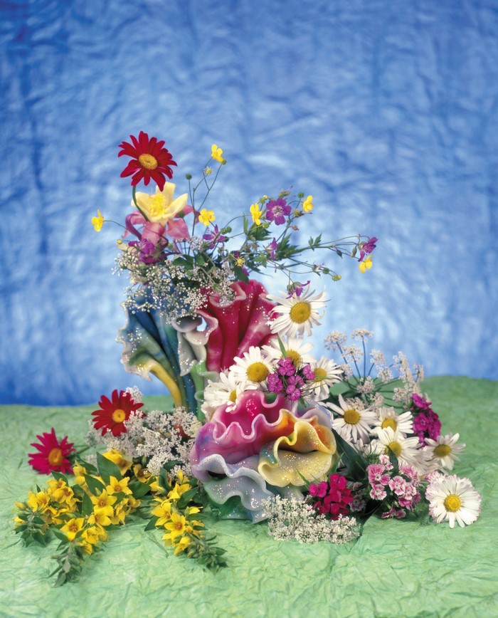Colorful flower arrangement with daisies and carnations