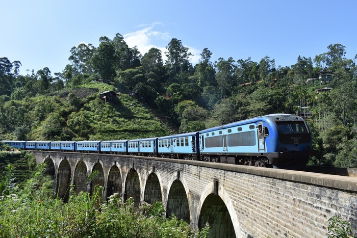 Blue train on Nine Arch Bridge, Sri Lanka