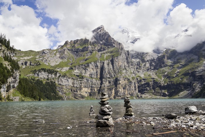 Lake Oeschinen with Mountains and Stone Stacks, Switzerland