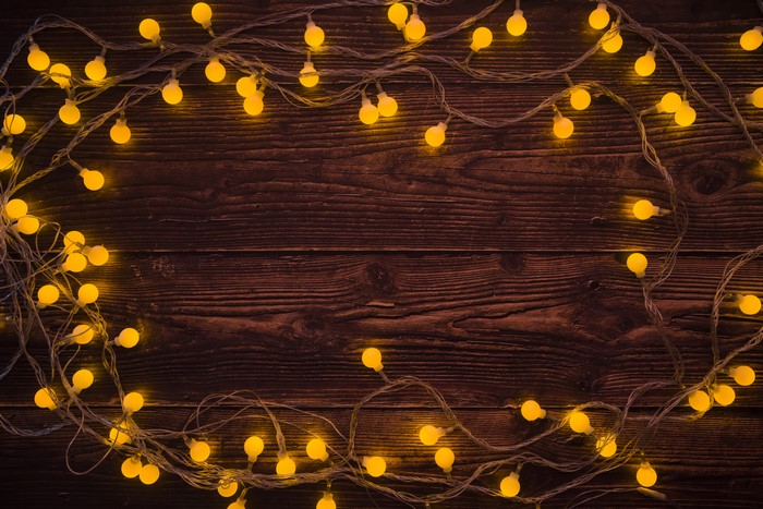 Fairy lights on wood planks