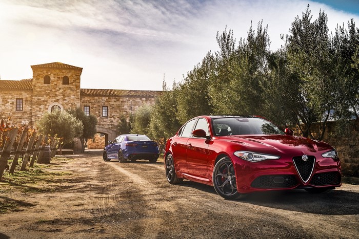 Red Alfa Romeo Giulia and Blue Alfa Romeo Giulia at Winery