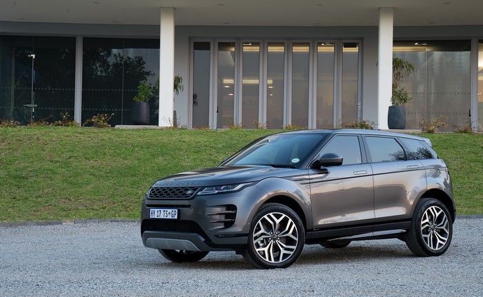 Grey Land Rover Evoque D180 SE R-Dynamic parked outside building