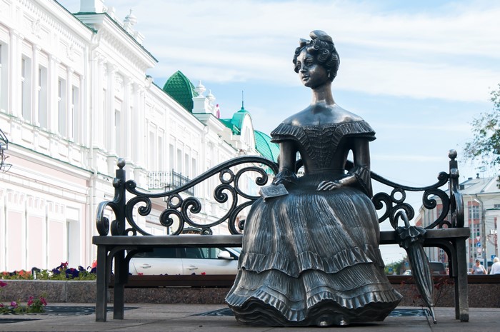 Lyuba sculpture on a bench in Omsk, Russia
