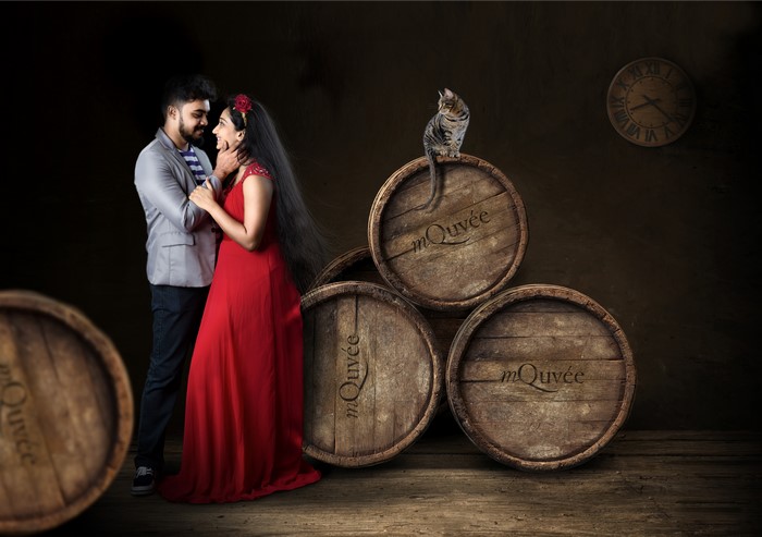 Couple with cat and barrels