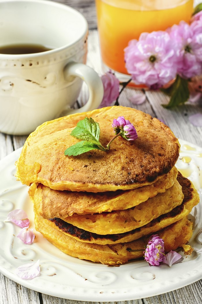 Stack of Pancakes with Coffee and Orange Juice