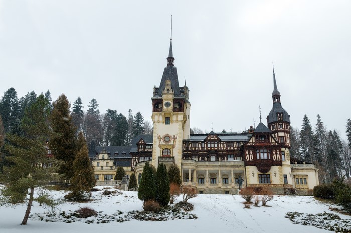 Peles Castle in Romania during winter with snow