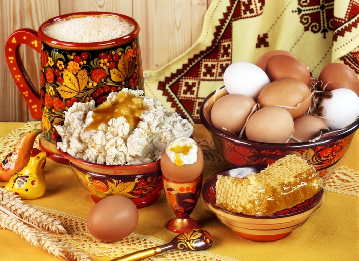 Still-life with cottage cheese, eggs, honey, and a mug