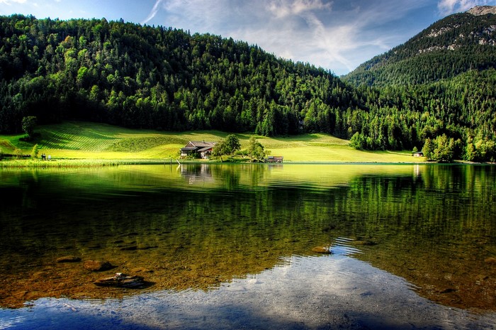 Hintersteinersee lake in Tyrol, Austria with mountains and forests