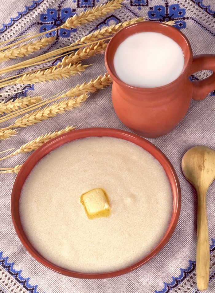 Porridge with butter and milk with wheat stalks