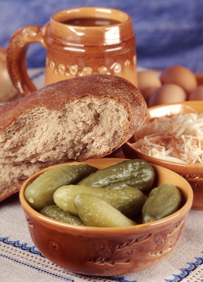 Bread, Cucumbers, and Sauerkraut with a Mug of Drink