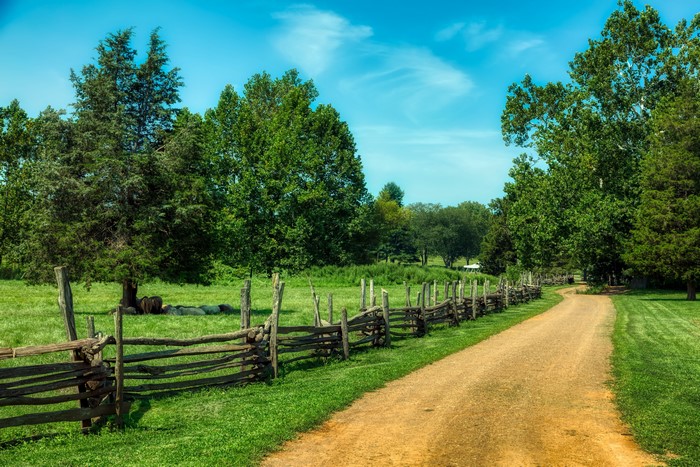 Split-rail fence along a dirt road in New Jersey