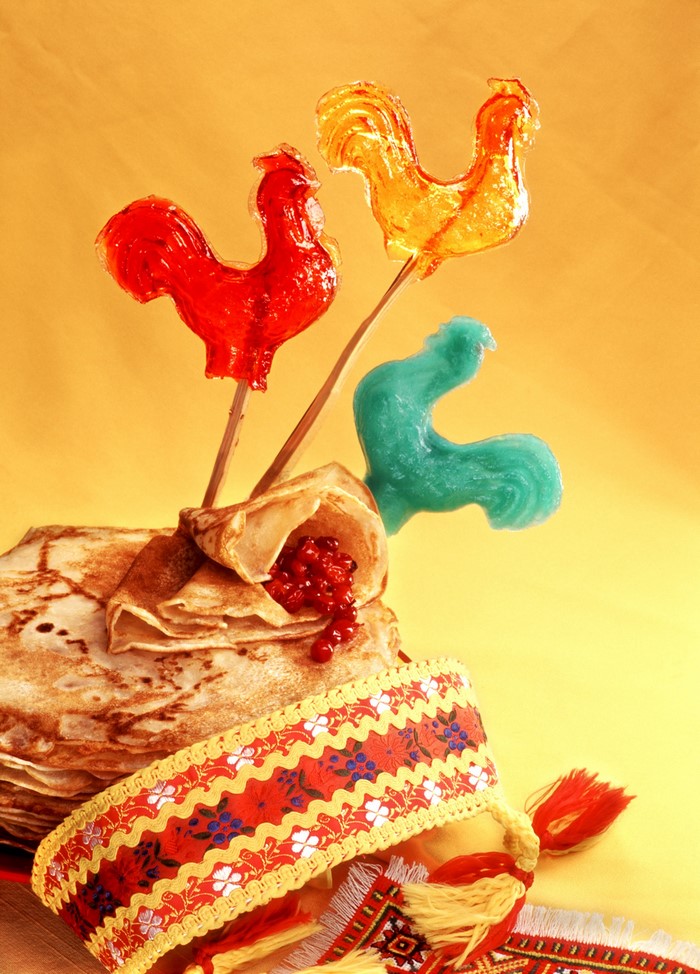 Rooster lollipops and pancakes with berries