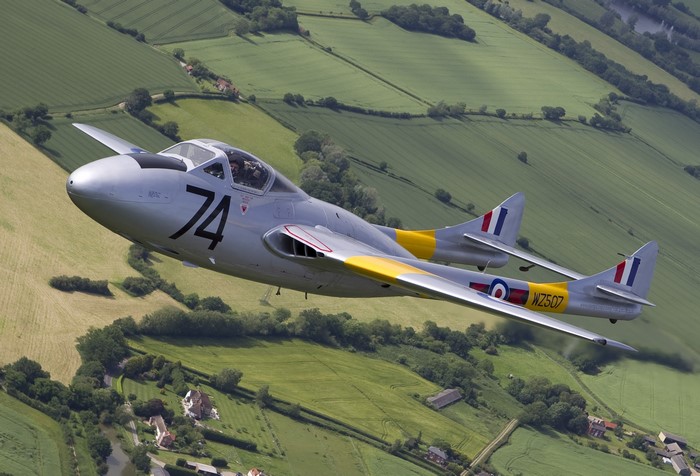 De Havilland Vampire T11 WZ507 in flight over countryside
