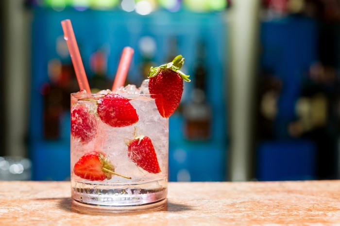 Strawberry Highball Drink with Ice and Straws