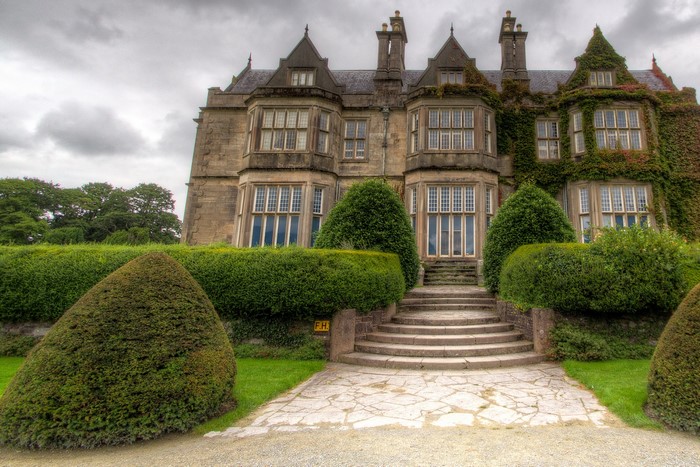 Muckross House Mansion with Stairs and Shrubs in Ireland