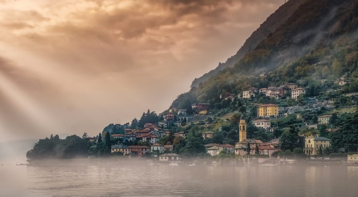 Colonno, Lake Como, Italy with Fog and Sunbeams