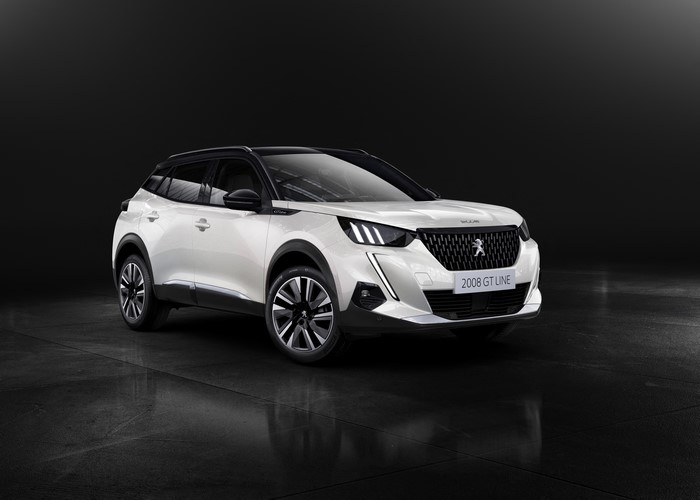 White Peugeot 2008 GT Line on a dark background