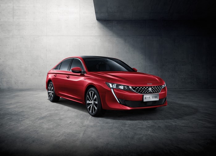 Red Peugeot 508L GT Sedan