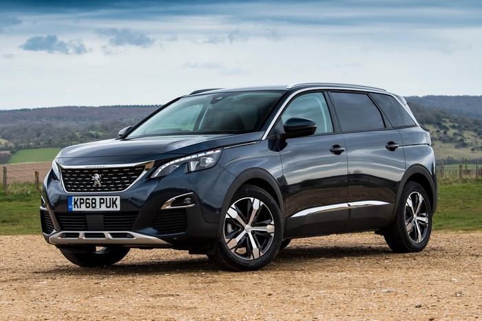 Peugeot 5008 SUV parked on a dirt road