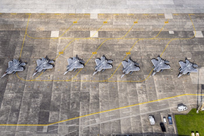 USAF F-22 Raptors lined up at Yokota Air Base, Japan