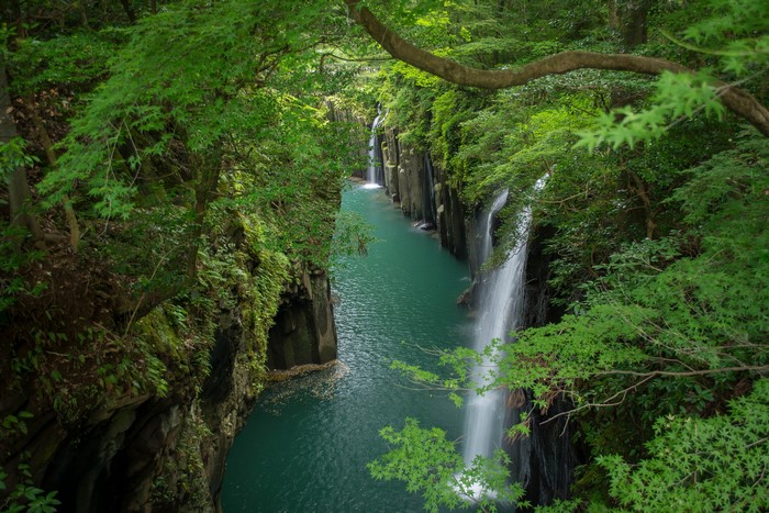 Takachiho Gorge with waterfalls and lush greenery, Japan