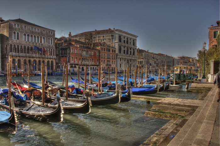 Gondolas docked on a canal in Venice, Italy