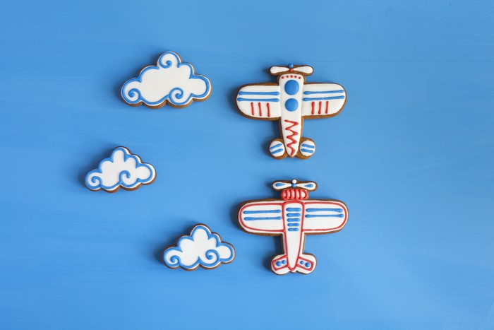 Airplane and Cloud Cookies on Blue Background