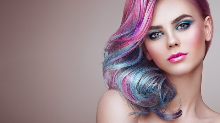 Woman with colorful hair and makeup by Oleg Gekman