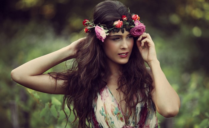 Woman with flower crown and floral dress
