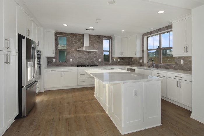 Modern Kitchen with Island and Hexagonal Tile Backsplash