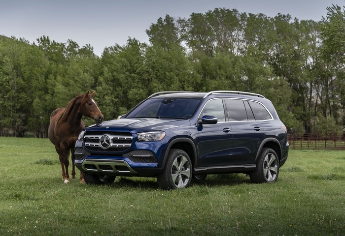 Blue Mercedes-Benz GLS 450 4MATIC with Horse