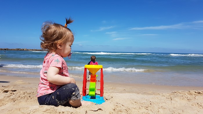 4K Beach Scene with Toddler and Toy