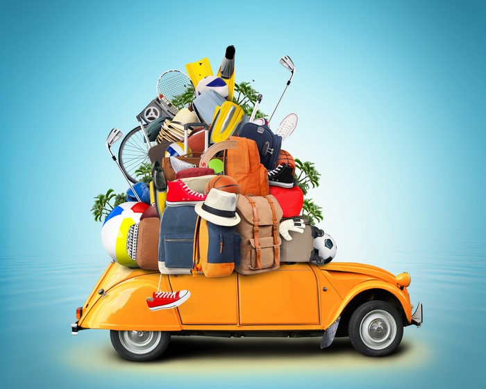 Car overloaded with luggage and sports equipment
