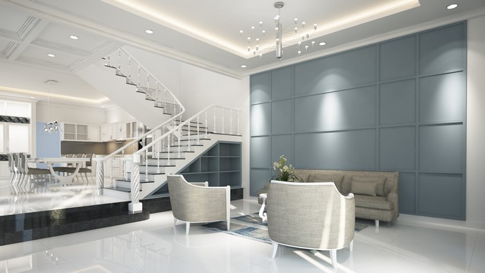 Modern living room with stairs and kitchen