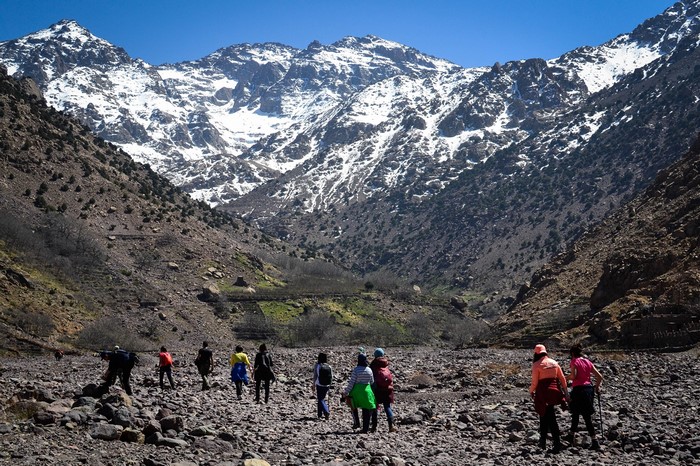 Tourists hiking in the Atlas Mountains, Morocco