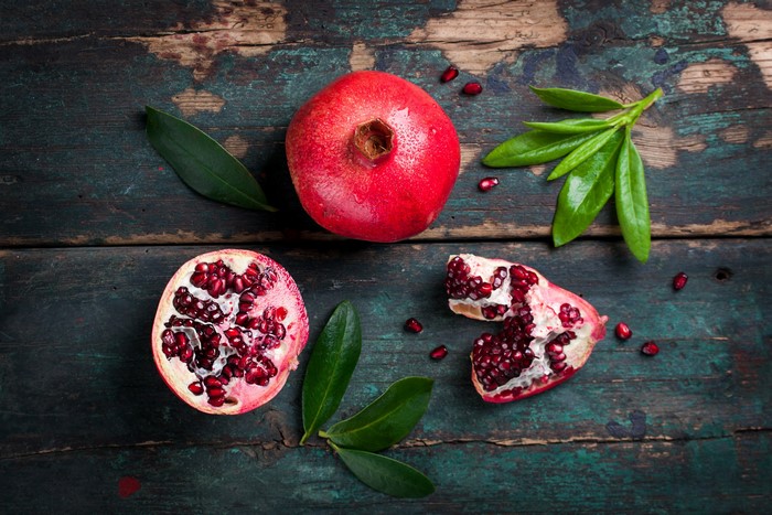 Pomegranate on Wood Planks