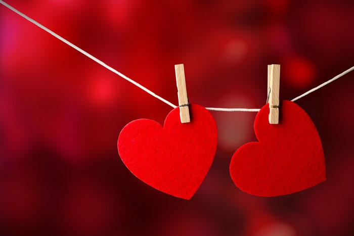 Two red hearts on a clothesline