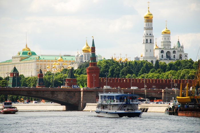 Moscow Kremlin and riverboat on Moscow River