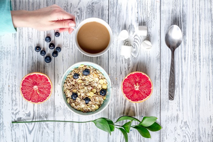 Breakfast with Muesli, Grapefruit, and Coffee