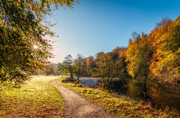 Autumn path by River Wharfe, Yorkshire, England