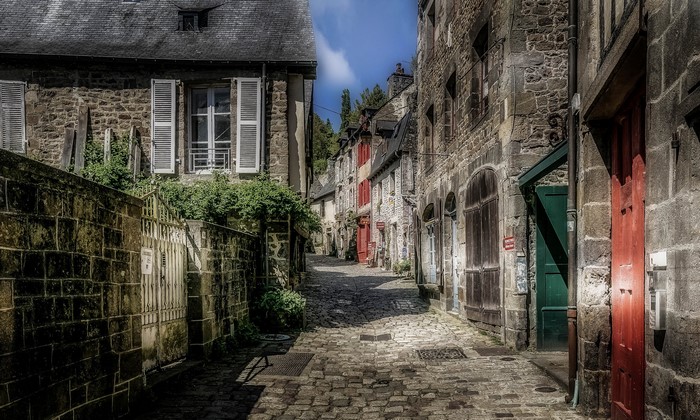 Cobblestone street in Dinan, Brittany, France