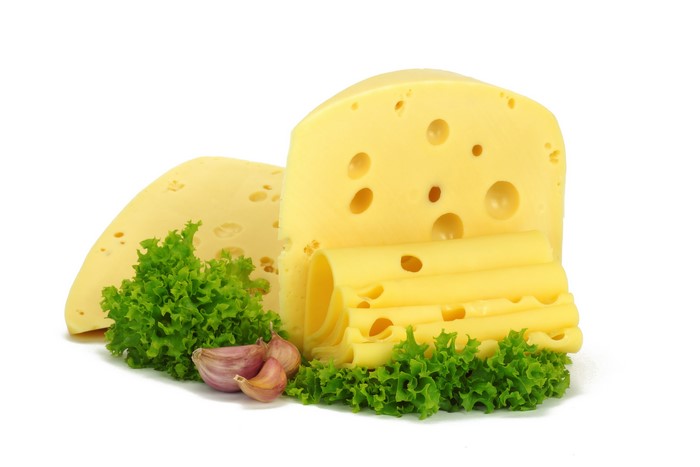 Cheese with lettuce and garlic on white background